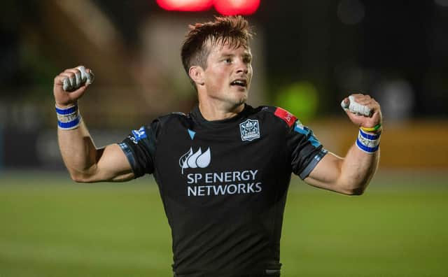 George Horne celebrates Glasgow Warriors' 52-24 win over Cardiff on their long-awaited return to Scotstoun. (Photo by Ross Parker / SNS Group)