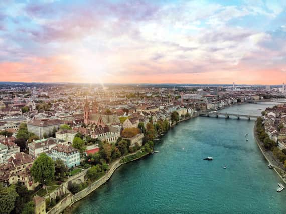 An aerial view of the Rhine running through Basel with Mittlerer Brücke, Münsterfähre and Basler Münster (Cathedral). Pic: Contributed
