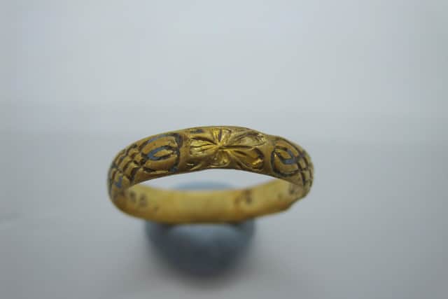 The 17th century gold posy ring (Photo: Robin Potter / SWNS.COM).