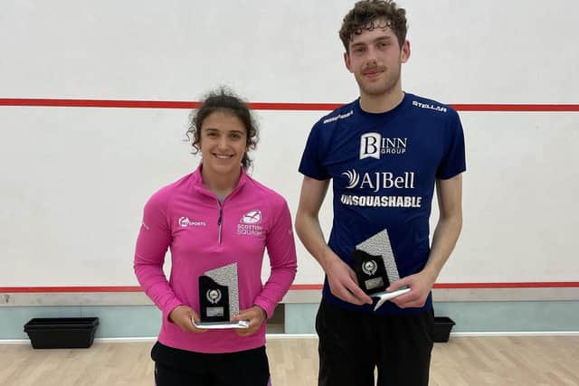 Georgia Adderley and Rory Stewart show off their trophies after their victories in Peterborough.