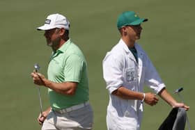 Lee Westwood and his caddie and son Sam during a practice round prior to the Masters at Augusta National Golf Club. Picture: Kevin C. Cox/Getty Images.