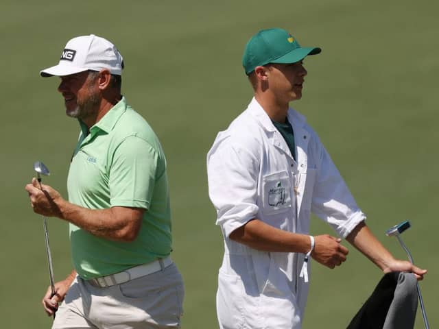 Lee Westwood and his caddie and son Sam during a practice round prior to the Masters at Augusta National Golf Club. Picture: Kevin C. Cox/Getty Images.