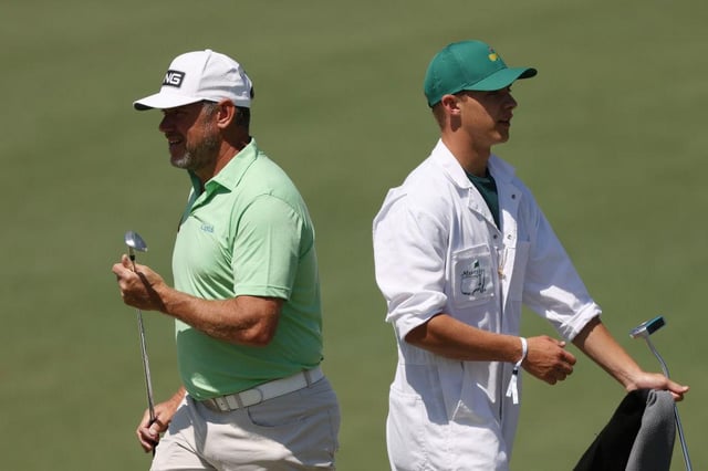 Lee Westwood and his caddie and son Sam during a practice round prior to the Masters at Augusta National Golf Club. Picture: Kevin C. Cox/Getty Images.