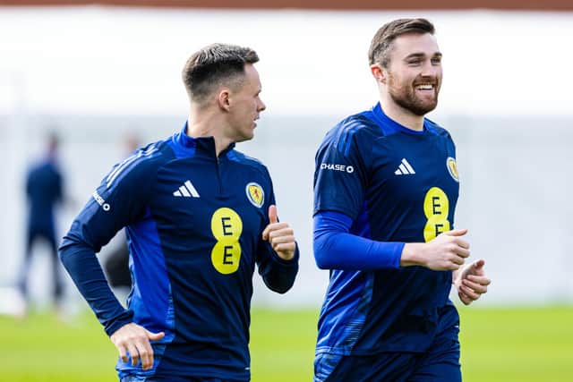 Lawrence Shankland and John Souttar during a Scotland training session at Lesser Hampden, on March 19, 2024, in Glasgow, Scotland.  (Photo by Craig Foy / SNS Group)