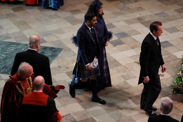 First Minister of Scotland Humza Yousaf and Nadia El-Nakla arriving ahead of the coronation of King Charles III and Queen Camilla at Westminster Abbey