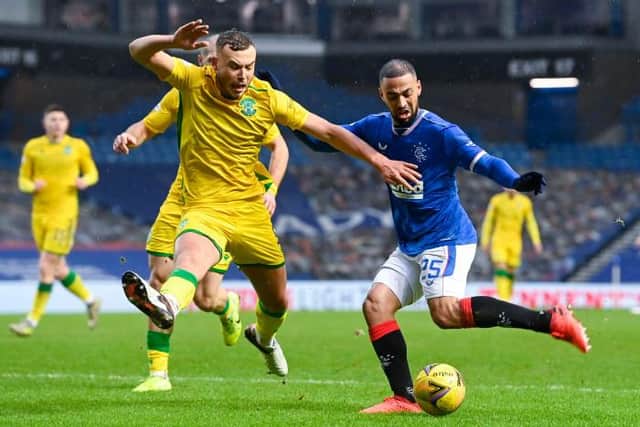 Rangers' Kemar Roofe (R) and Hibernian's Ryan Porteous during the Scottish Premiership match between Rangers and Hibernian at Ibrox Stadium on December 26, 2020, in Glasgow, Scotland. (Photo by Rob Casey / SNS Group)