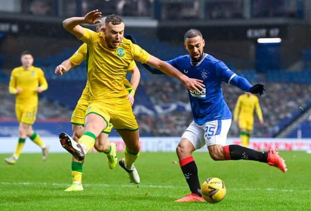 Rangers' Kemar Roofe (R) and Hibernian's Ryan Porteous during the Scottish Premiership match between Rangers and Hibernian at Ibrox Stadium on December 26, 2020, in Glasgow, Scotland. (Photo by Rob Casey / SNS Group)