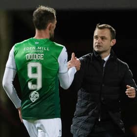 Shaun Maloney speaks to his Hibs striker Christian Doidge at full time.