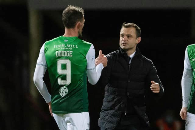 Shaun Maloney speaks to his Hibs striker Christian Doidge at full time.