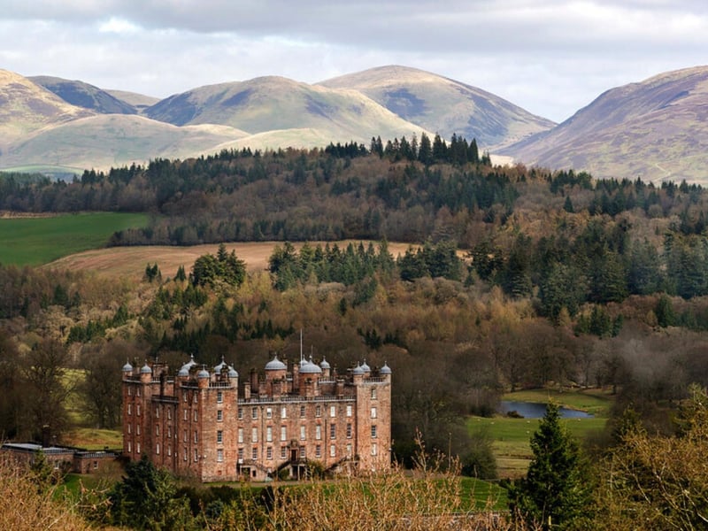 Drumlanrig Castle is a distinctively pink sandstone castle located in the Queensberry Estate in Dumfries and Galloway. It came to be in the 14th century when William Douglas became the first Laird of Drumlanrig.