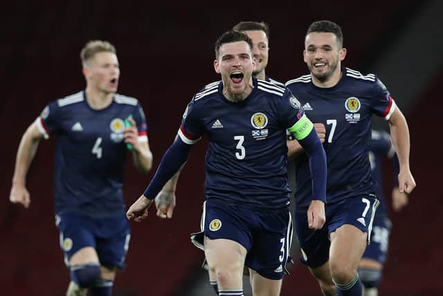 Andy Robertson of Scotland celebrates after his team's victory in the penalty shoot out during the UEFA EURO 2020 Play-Off semi-finals match between Scotland and Israel at Hampden Park on October 08, 2020 in Glasgow, Scotland. (Photo by Ian MacNicol/Getty Images)