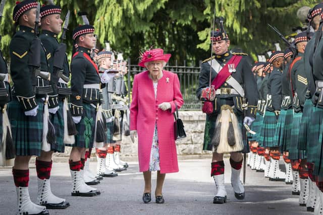 Queen Elizabeth II during an inspection of the Balaklava Company, 5 Battalion The Royal Regiment of Scotland at the gates at Balmoral, as she takes up summer residence at the castle.