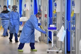 NHSClinical staff wear Personal Protective Equipment (PPE). Picture: Neil Hall/PA Wire