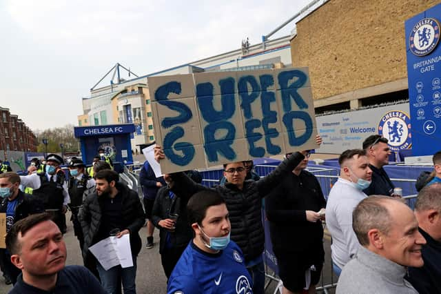 Chelsea fans protest against the Super League ahead of their match on Tuesday against Brighton.