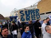 Chelsea fans protest against the Super League ahead of their match on Tuesday against Brighton.