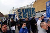 Chelsea fans protest against the Super League ahead of their match on Tuesday against Brighton.