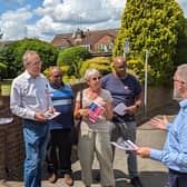 Labour campaigners listen to the shadow justice secretary, Steve Reed.