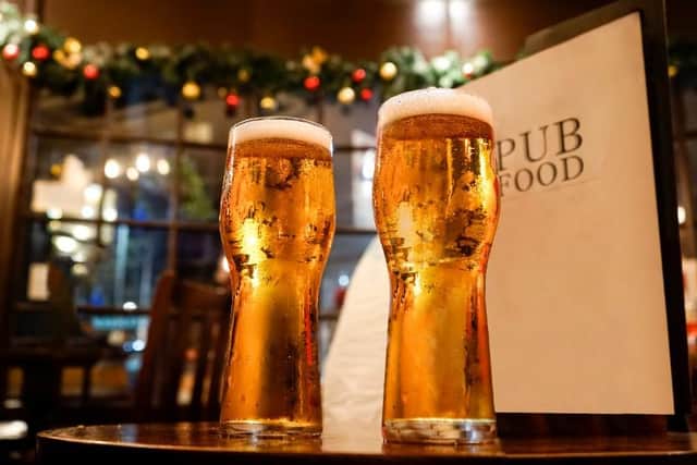 Those who form Christmas bubbles will not be able to go to the pub with the other households during the festive period (Shutterstock)