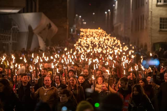 Edinburgh's Hogmanay festival usually gets underway with a torchlight parade down the Royal Mile. Picture: Ian Georgeson
