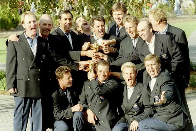 European team members surround team captain Bernard Gallacher after winning the 1995 Ryder Cup at Oak Hill Country Club. Picture: Robert Sullivan/AFP via Getty Images.