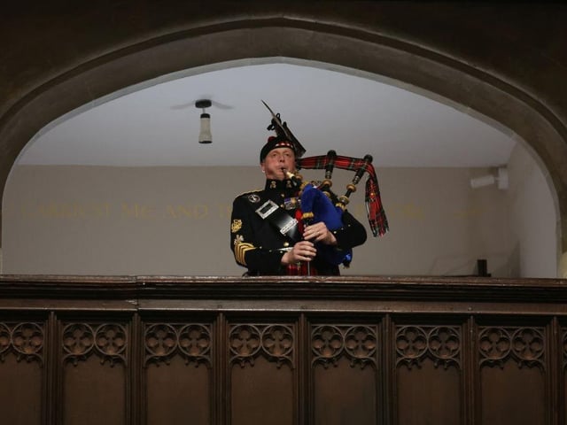 LONDON, ENGLAND - SEPTEMBER 19: A piper plays during the State Funeral of Queen Elizabeth II on September 19, 2022 in London, England.  Elizabeth Alexandra Mary Windsor was born in Bruton Street, Mayfair, London on 21 April 1926. She married Prince Philip in 1947 and ascended the throne of the United Kingdom and Commonwealth on 6 February 1952 after the death of her Father, King George VI. Queen Elizabeth II died at Balmoral Castle in Scotland on September 8, 2022, and is succeeded by her eldest son, King Charles III. (Photo by Phil Noble - WPA Pool/Getty Images)