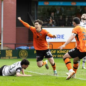 Chris Mochrie scores the winner against Ayr United to seal Dundee United's Premiership return. (Photo by Mark Scates / SNS Group)