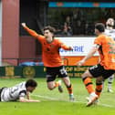 Chris Mochrie scores the winner against Ayr United to seal Dundee United's Premiership return. (Photo by Mark Scates / SNS Group)