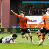 Chris Mochrie scores the winner against Ayr United to seal Dundee United's Premiership return. (Photo by Mark Scates / SNS Group)