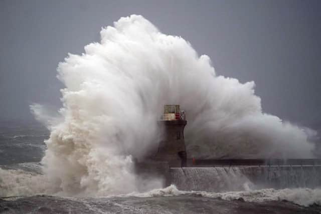 Waves batter South Shields Lighthouse during Storm Babet PIC: Owen Humphreys/PA Wire