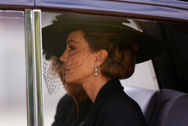 Catherine, Princess of Wales is seen in a car during the State Funeral of Queen Elizabeth II at Westminster Abbey.