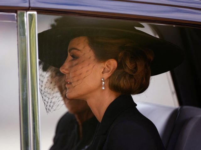 Catherine, Princess of Wales is seen in a car during the State Funeral of Queen Elizabeth II at Westminster Abbey.