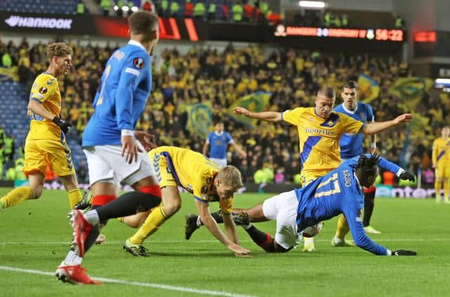 Rangers were denied a strong penalty claim when Joe Aribo went down in the box under this challenge from Brondby defender Sigurd Rosted at Ibrox. (Photo by Craig Williamson / SNS Group)
