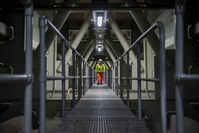 A walkway inside the bridge deck which runs parallel to the monorail shuttle. (Photo by Lisa Ferguson/The Scotsman)