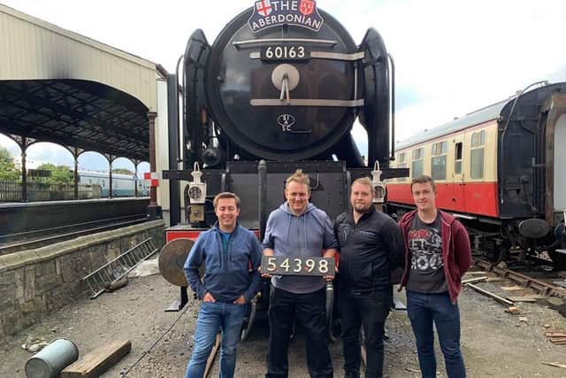 Ben Alder Project team members Jack Goodall, Gavin Johnson, Anthony Wiaczek and Ross Isdale in front of Tornado during its visit to the Bo'ness and Kinneil Railway in 2019. Picture: New Build Locomotive Scotland