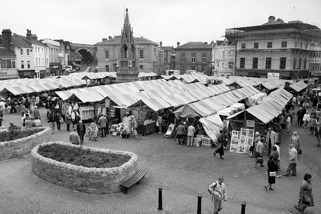 Back to 1990 when the market was bustling, full of stalls and shoppers.