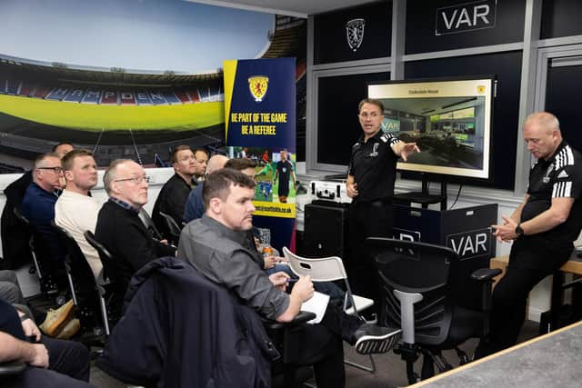 Members of the Scottish press are talked through how VAR will work.