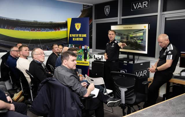 Members of the Scottish press are talked through how VAR will work.