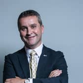 Angus MacNeil MP behind former SNP Westminster group leader, Ian Blackford.