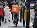 A delivery rider on a pavement in Glasgow city centre on Friday (Photo by John Devlin/The Scotsman)