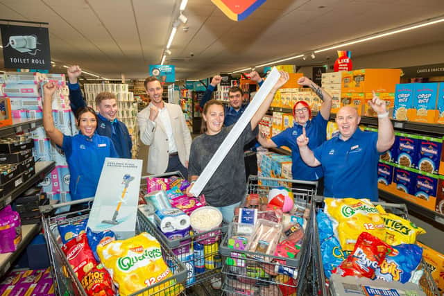 Gillian Currie raised a record total of £1,119.39 for CHAS as part of Aldi Scotland's Supermarket Sweep.