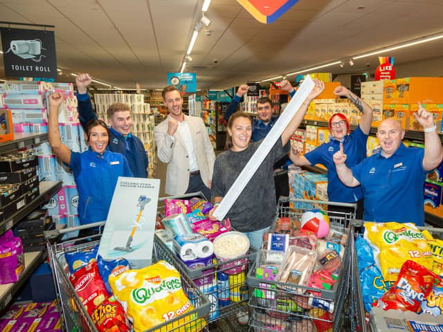 Gillian Currie raised a record total of £1,119.39 for CHAS as part of Aldi Scotland's Supermarket Sweep.