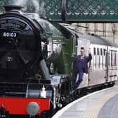 Support crew member Jayne Emsley on board Flying Scotsman during its 100th birthday celebrations at Edinburgh Waverley on Friday. Picture: Andrew Milligan/PA Wire