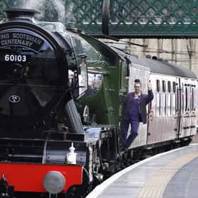 Support crew member Jayne Emsley on board Flying Scotsman during its 100th birthday celebrations at Edinburgh Waverley on Friday. Picture: Andrew Milligan/PA Wire