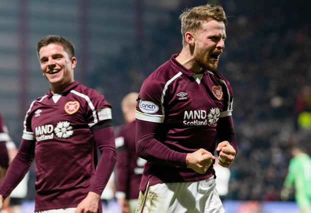 Stephen Kingsley celebrates after scoring Hearts' second goal in the win over Aberdeen. (Photo by Ross Parker / SNS Group)