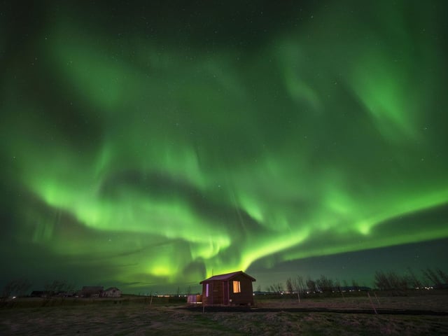 The northern lights over Arabaer near Selfoss in the south of Iceland.
