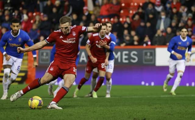 Lewis Ferguson equalised for Aberdeen against Aberdeen at Pittodrie with this penalty kick despite the ball moving slightly off the spot before he struck it. (Photo by Craig Williamson / SNS Group)