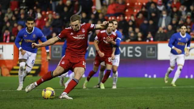 Lewis Ferguson equalised for Aberdeen against Aberdeen at Pittodrie with this penalty kick despite the ball moving slightly off the spot before he struck it. (Photo by Craig Williamson / SNS Group)