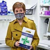 Nicola Sturgeon visits a Burnside chemist during campaigning for the Scottish Parliamentary election in Rutherglen, Scotland. (Photo by Jeff J Mitchell/Getty Images)
