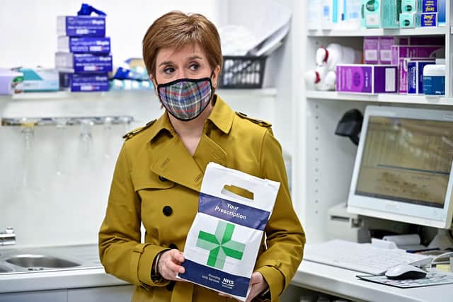 Nicola Sturgeon visits a Burnside chemist during campaigning for the Scottish Parliamentary election in Rutherglen, Scotland. (Photo by Jeff J Mitchell/Getty Images)