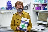 Nicola Sturgeon visits a Burnside chemist during campaigning for the Scottish Parliamentary election in Rutherglen, Scotland. (Photo by Jeff J Mitchell/Getty Images)